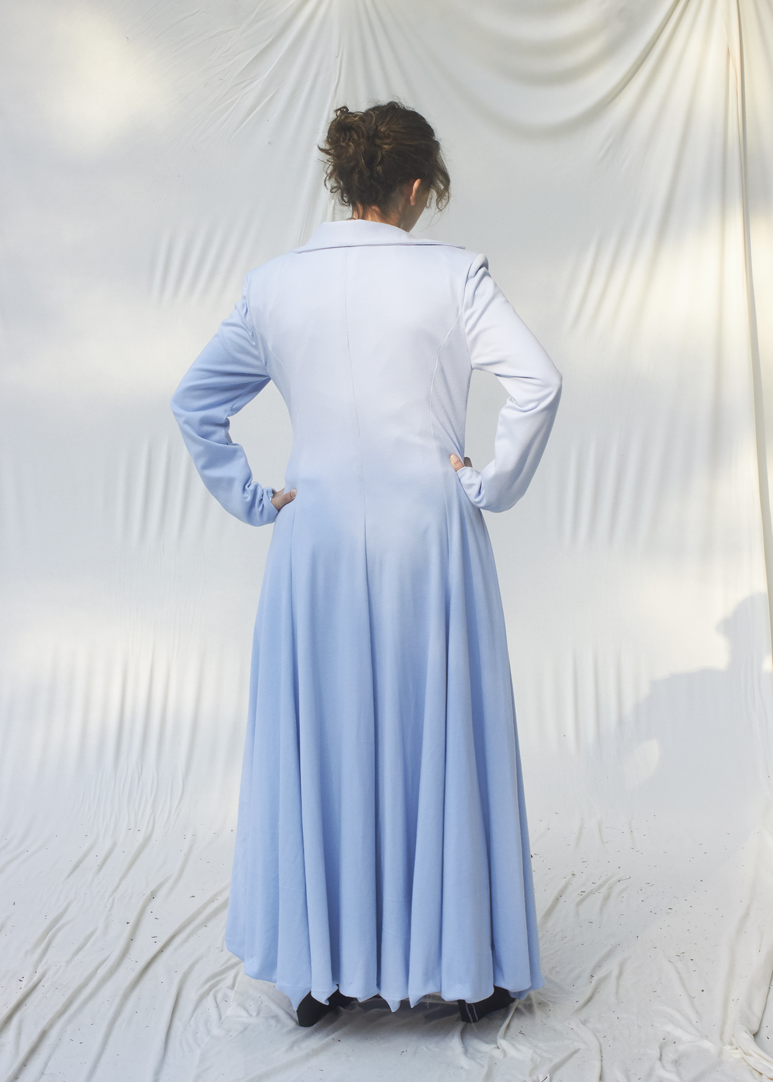 Back view of sky blue floor length coat