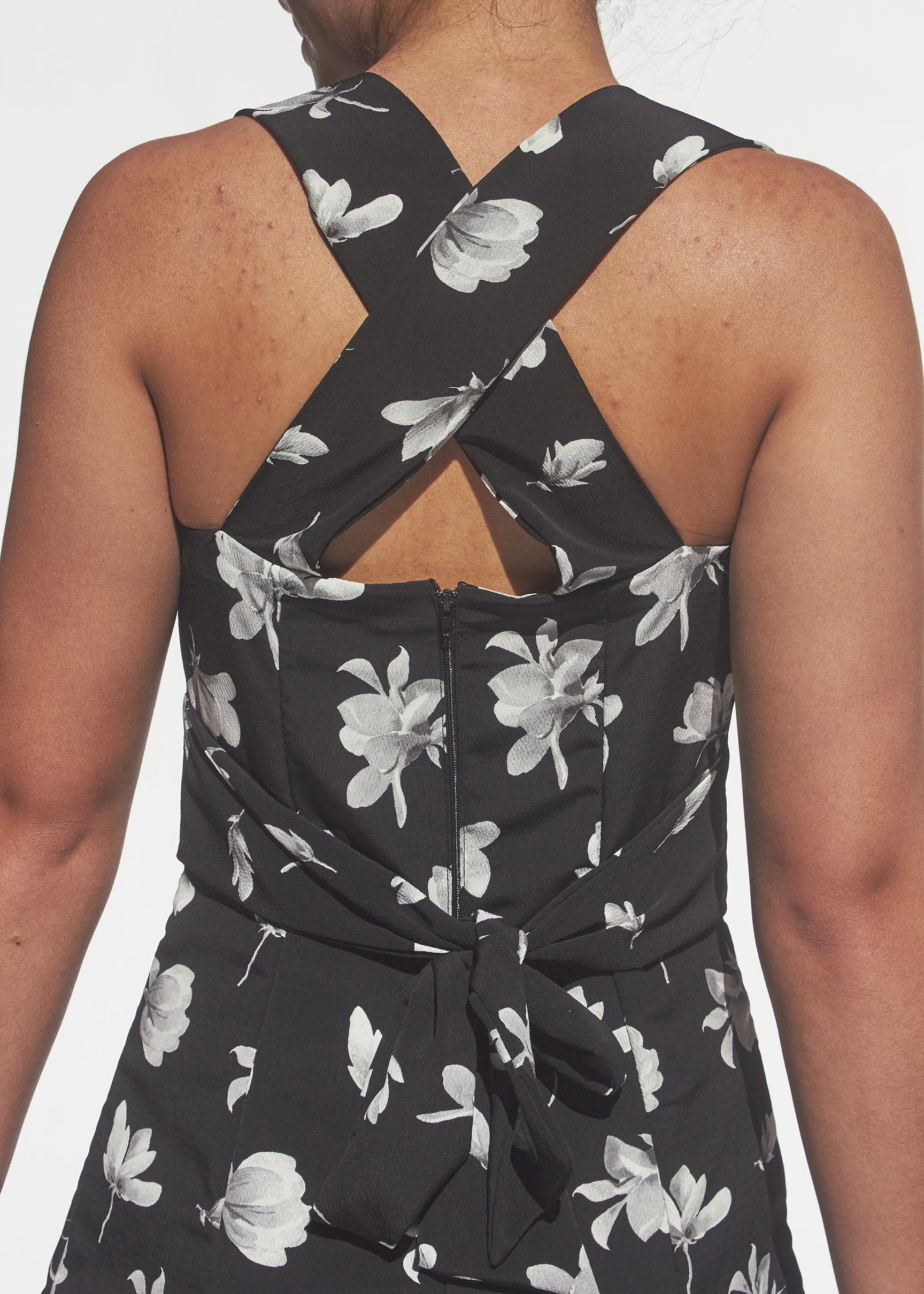 Close up photo of a back cross strap dress