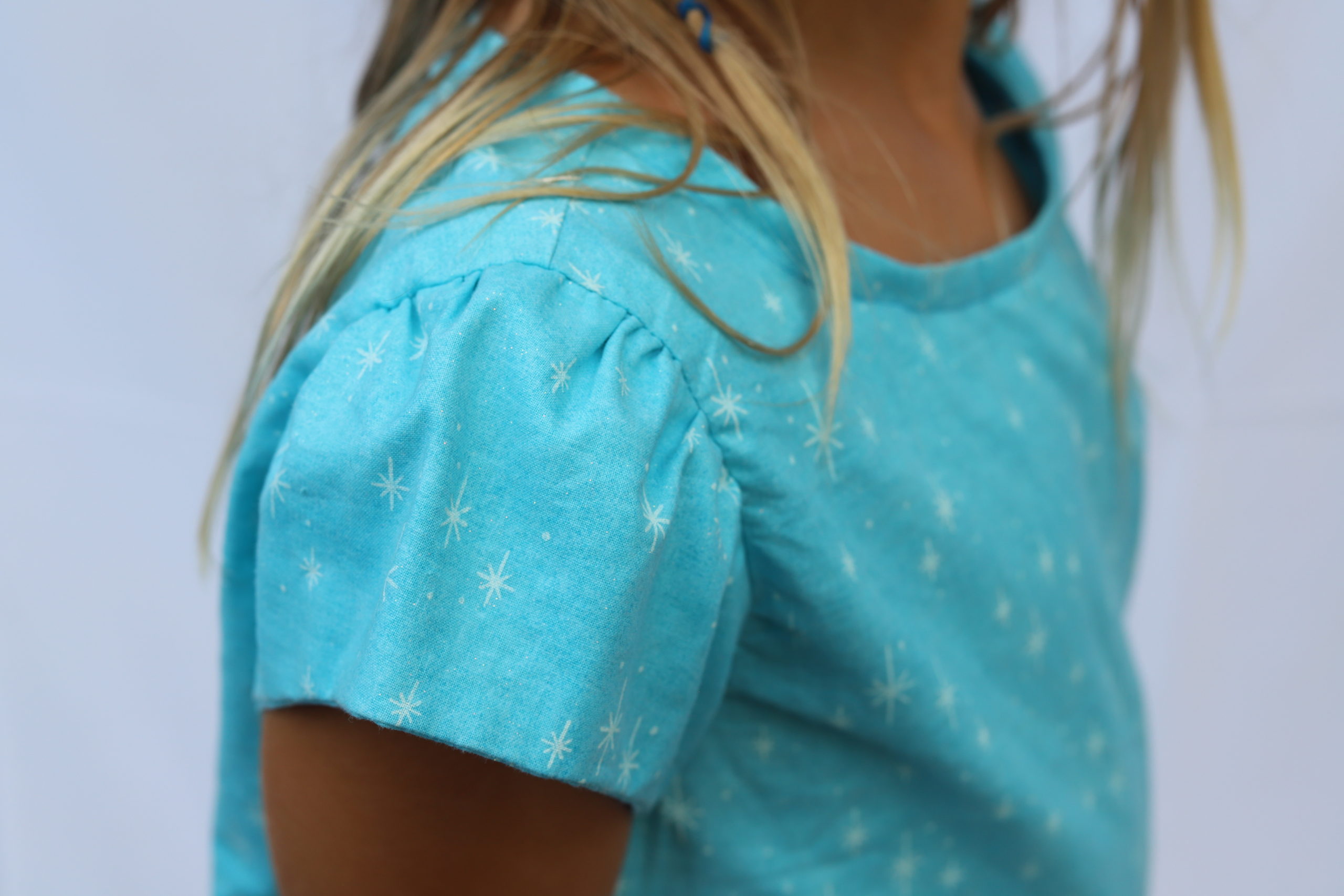 Photo of aqua colored set in short sleeve