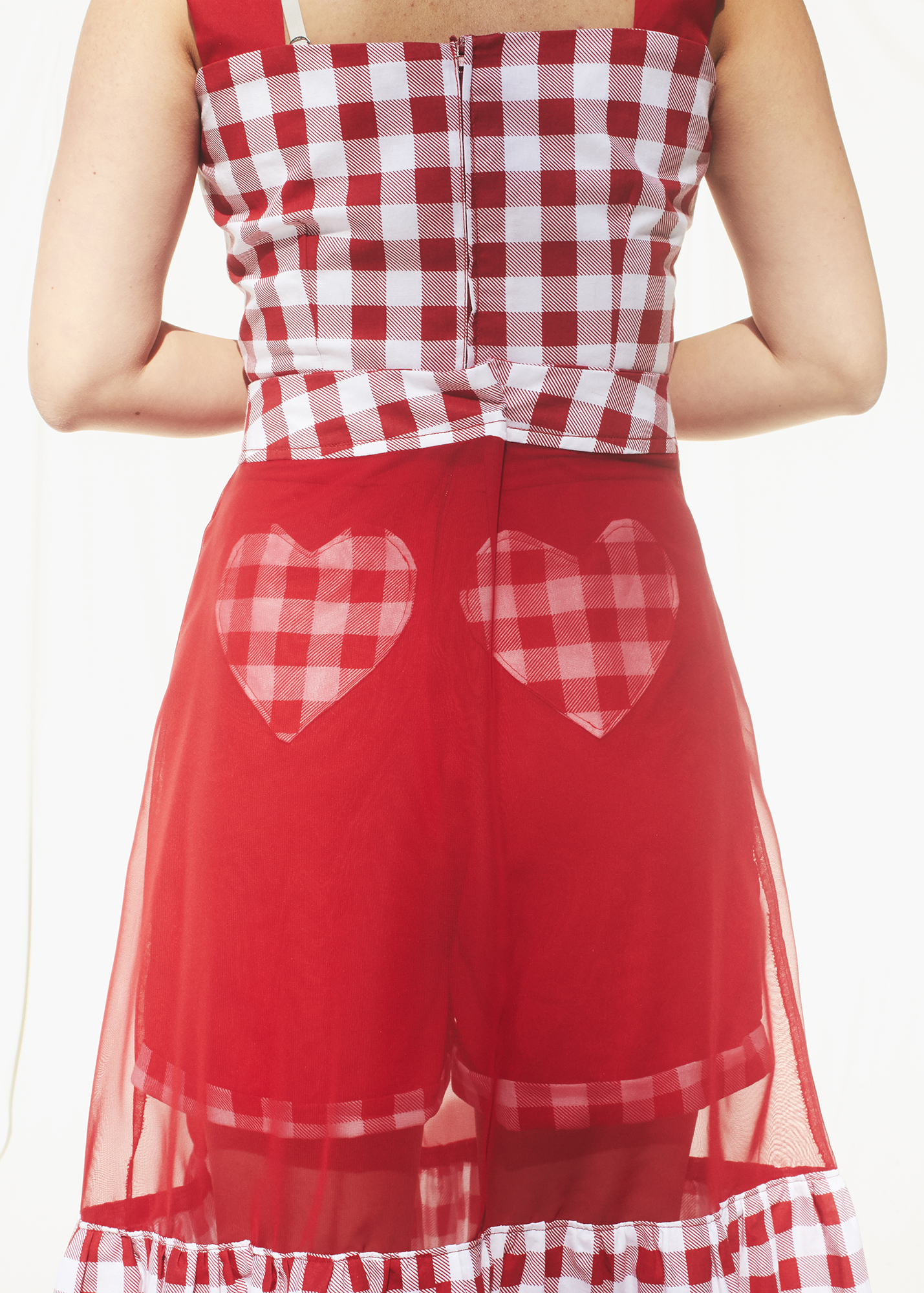 Back view of sheer skirt and red gingham heart pockets