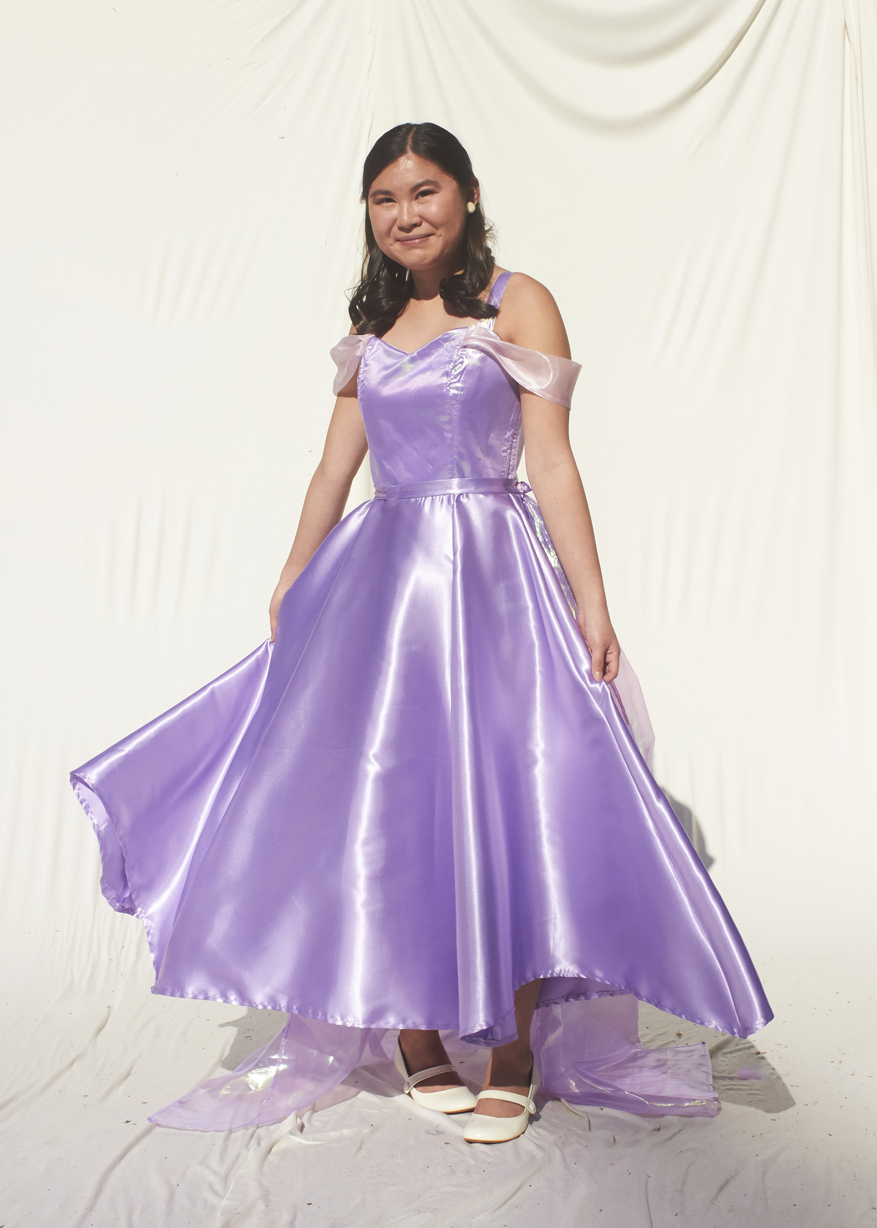 Girl in lavender princess tea length dress