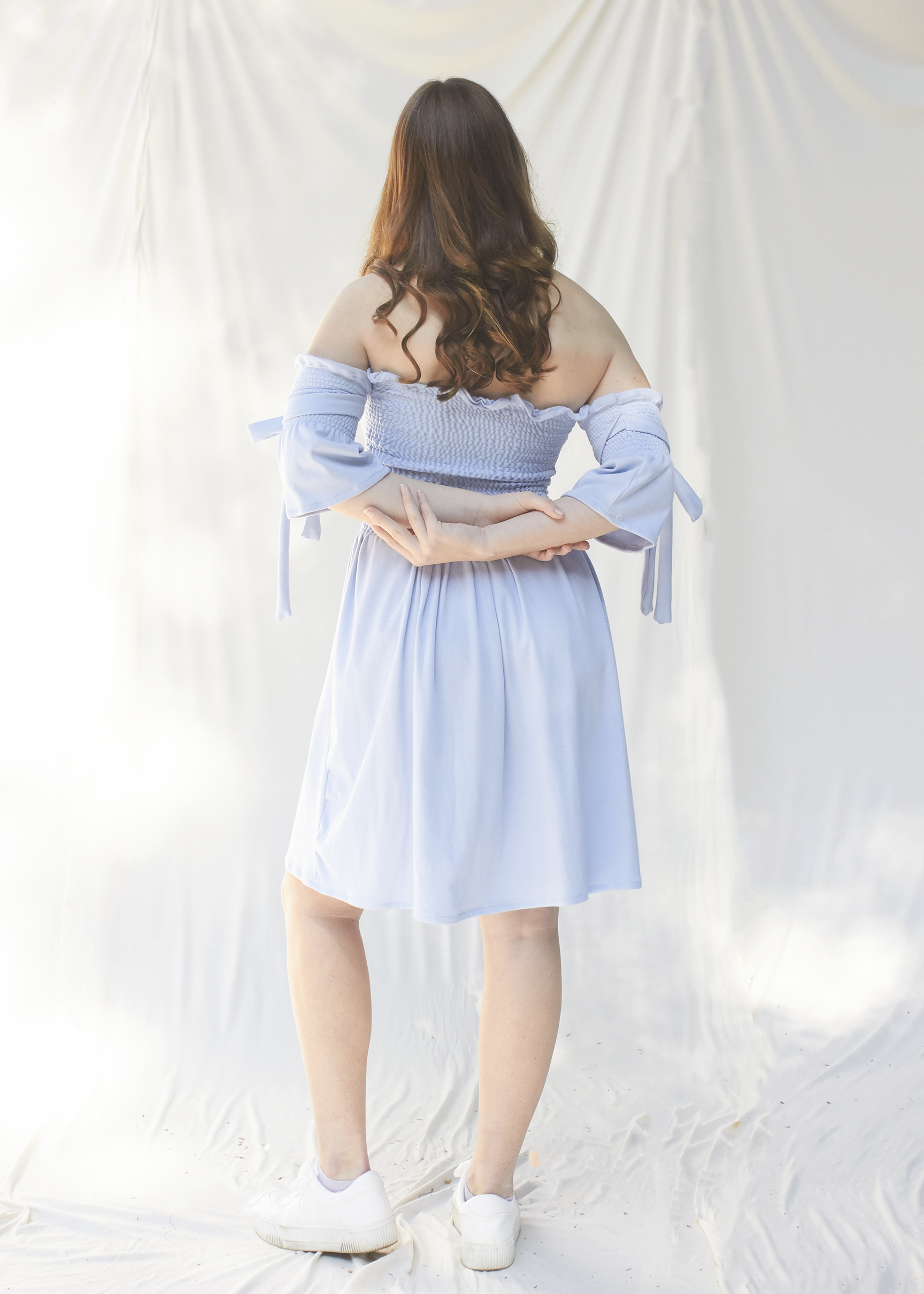 Back view of sky blue ruched dress