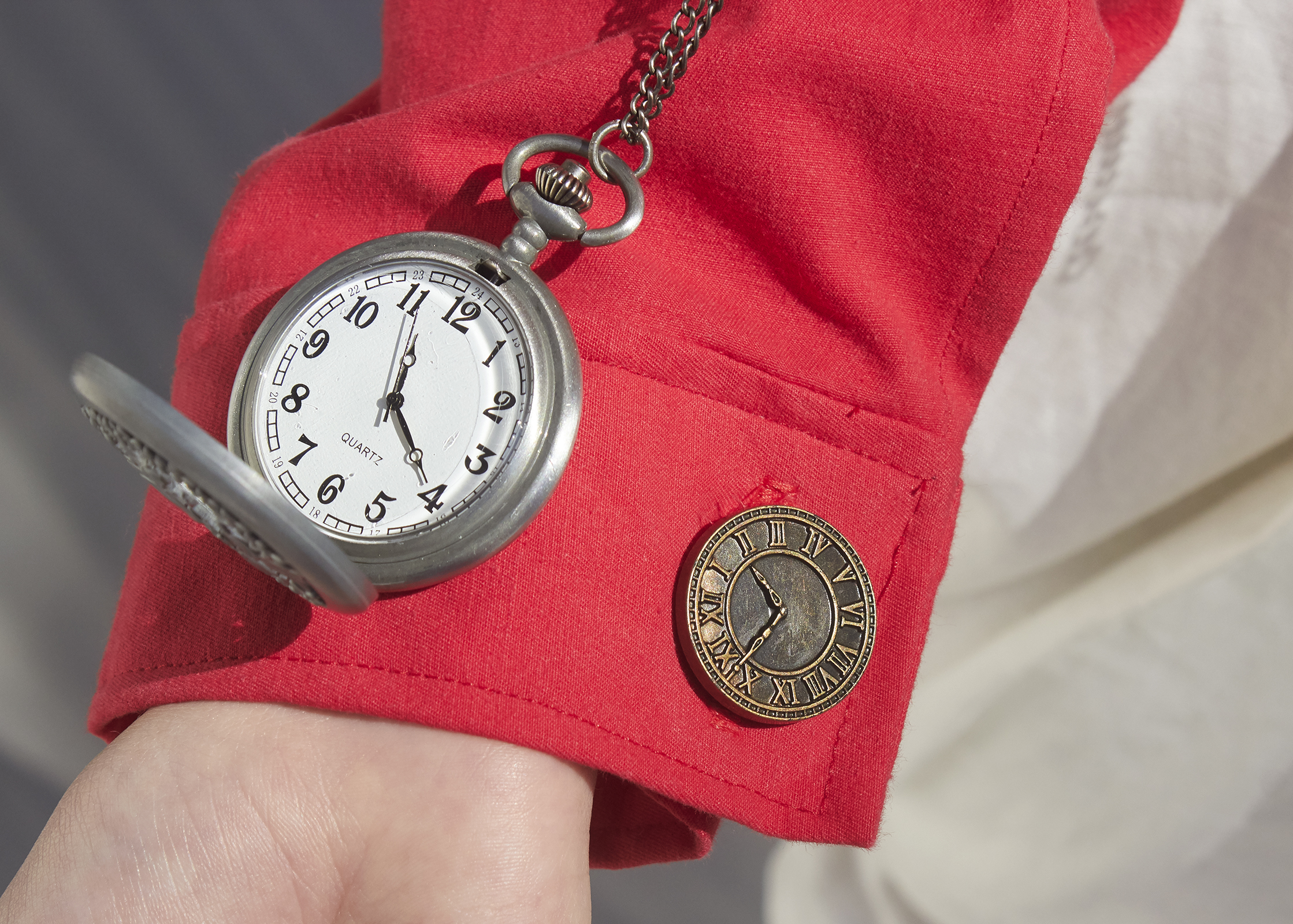 Detail shot of red denim cuff on a jacket