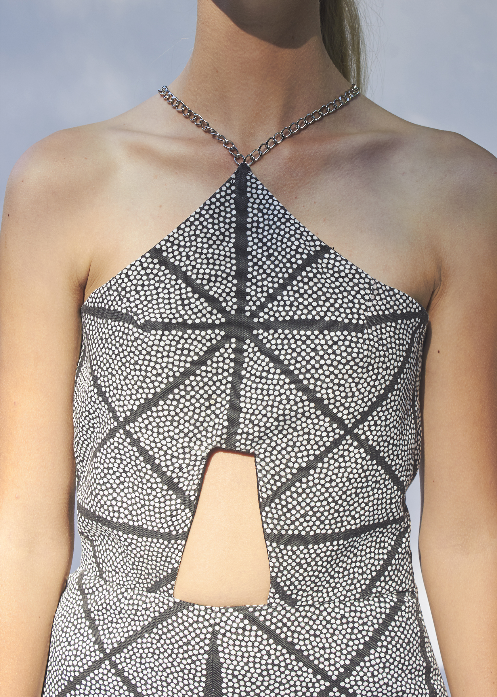 Close up of geometric jumpsuit