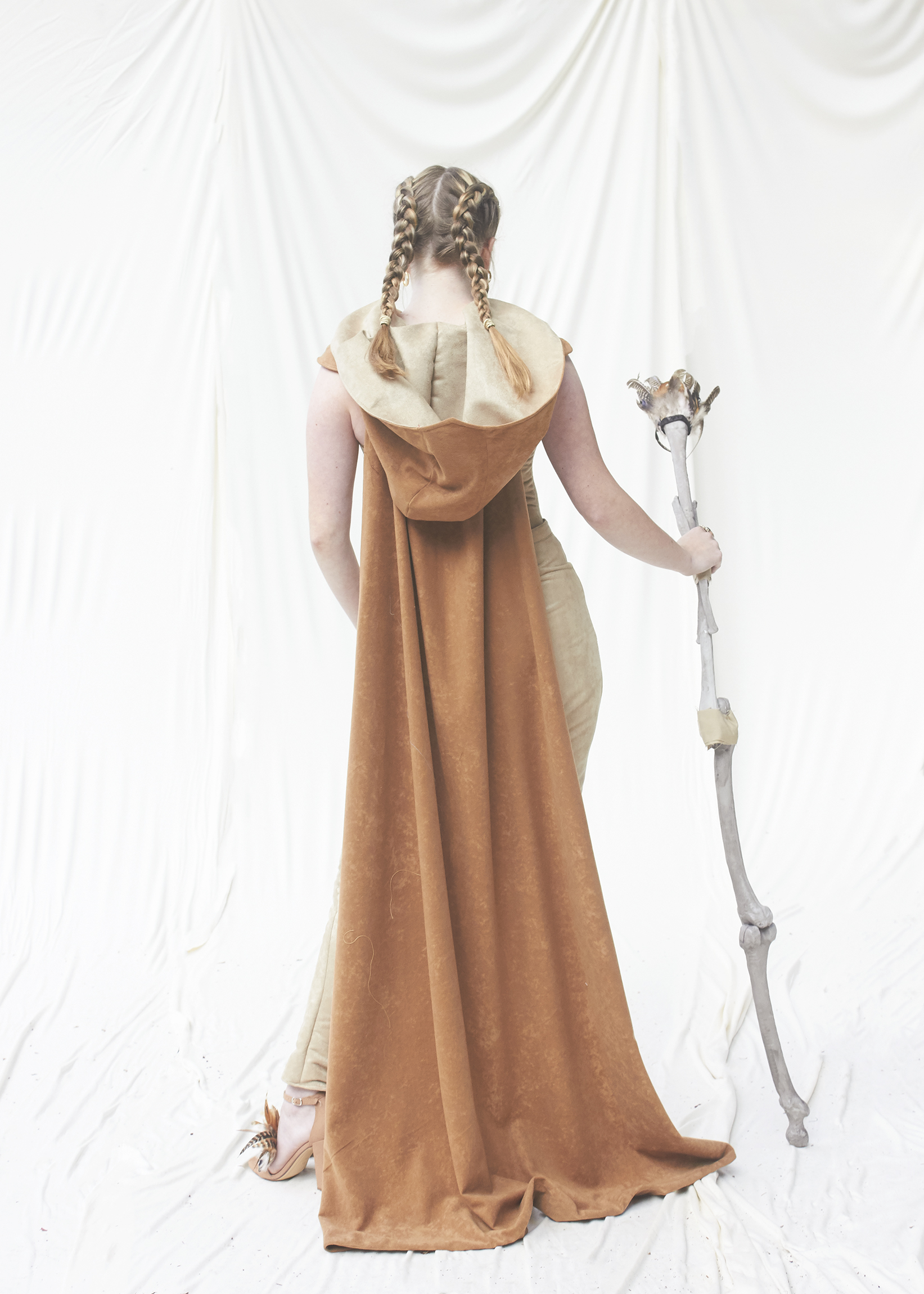 Back view of brown side cape for scar costume 