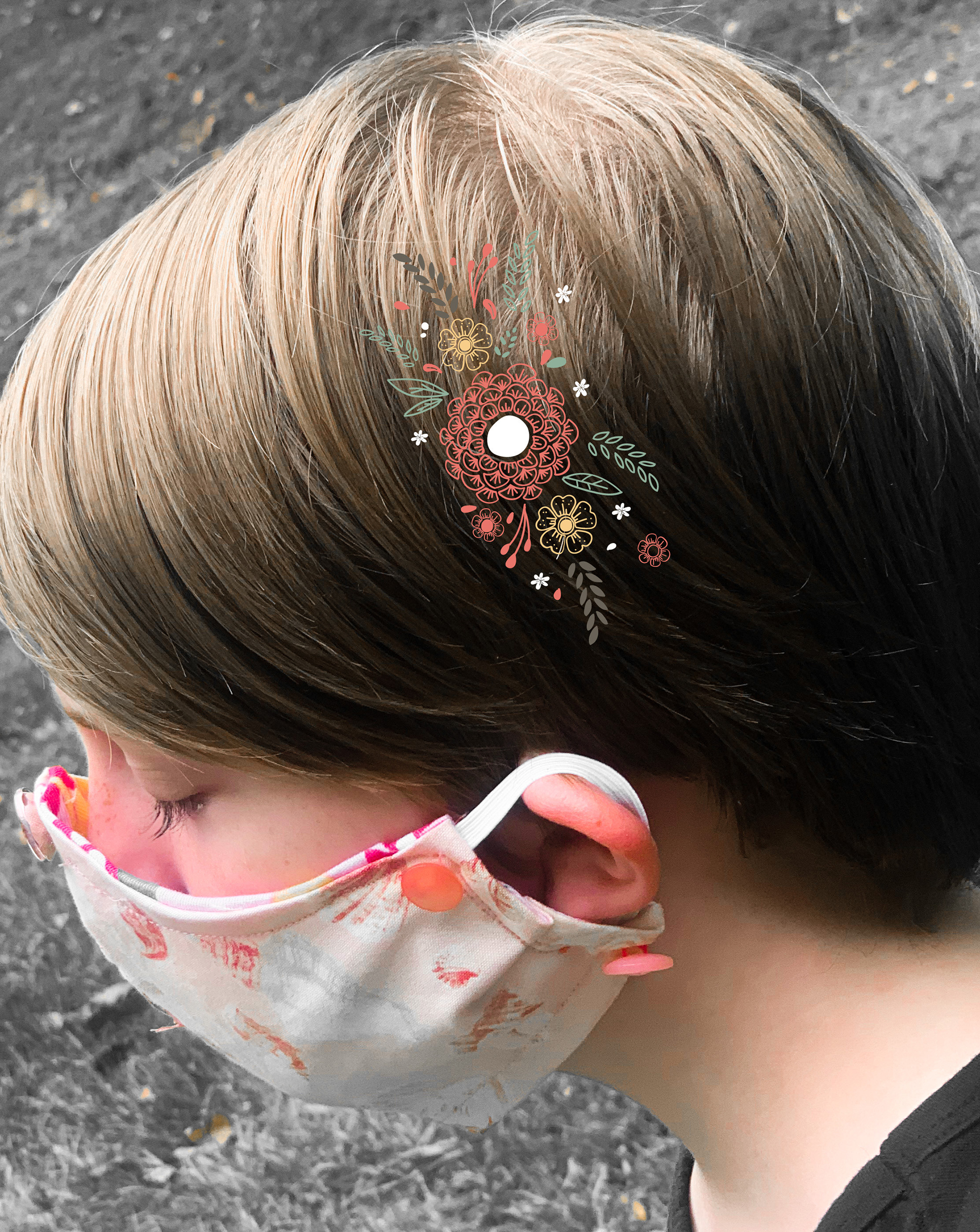 Side view of girl wearing pink sea shell face mask