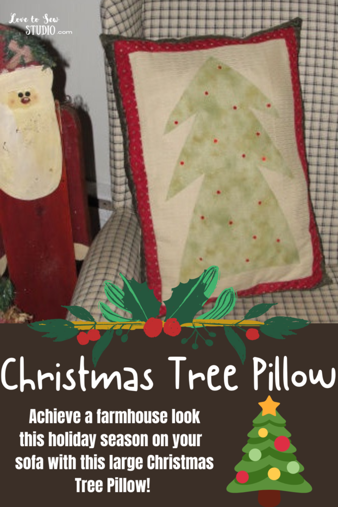 fabric pillow with a Christmas tree on it