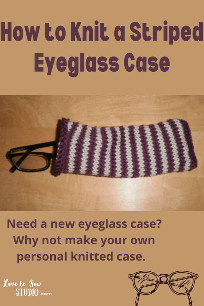 purple and white striped knitted glasses case